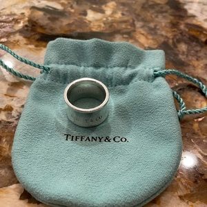 Tiffany & Co 1837 wide band ring.  Size 6. Previously loved.